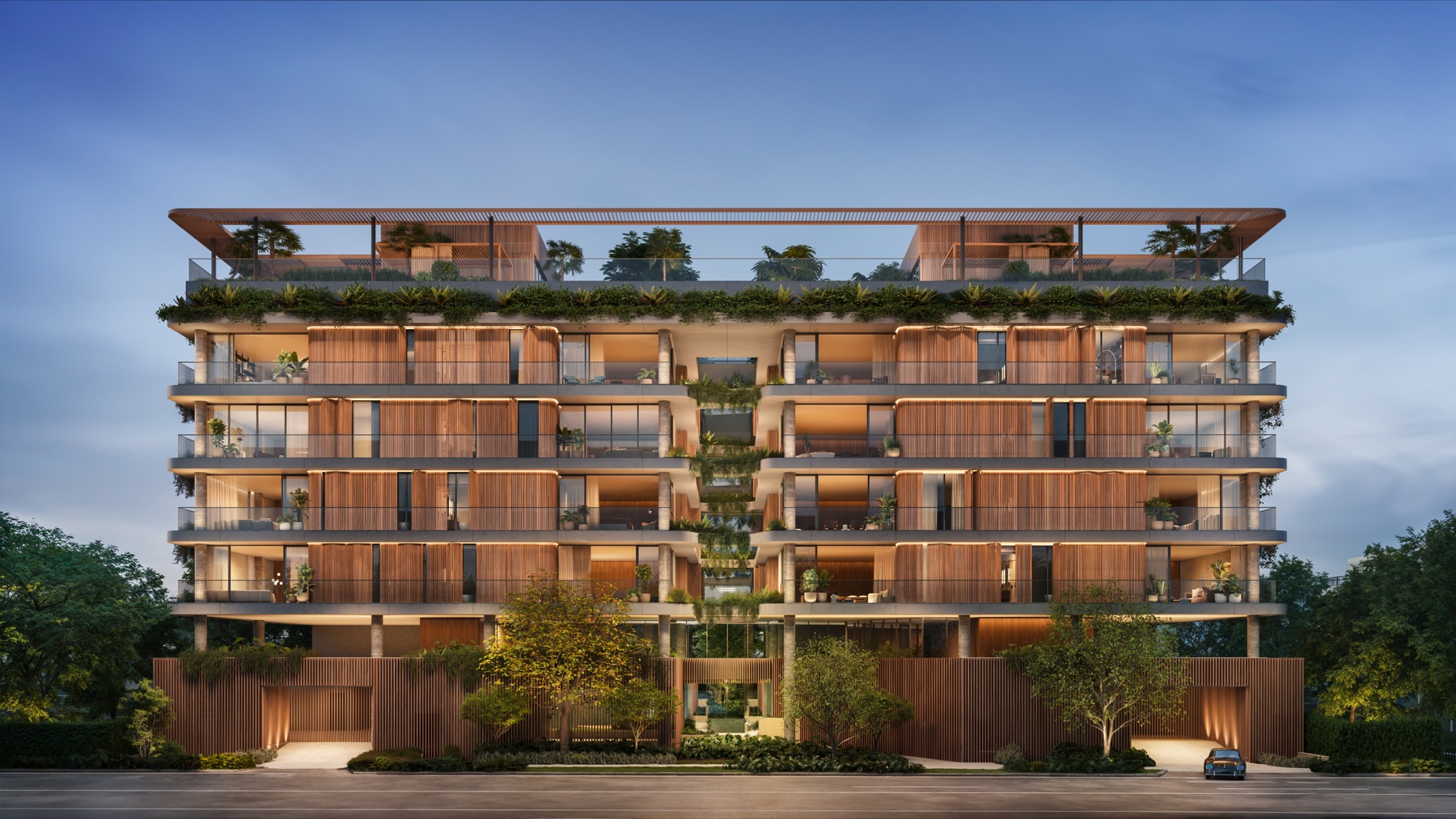 Colette Residences at Brickell — a boutique five-level residential building at 1880 Brickell Avenue in South Brickell, shown at twilight. Design architecture and interiors by OSPA, developed by Meta Development.